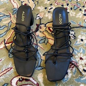 Strappy black kitten heel